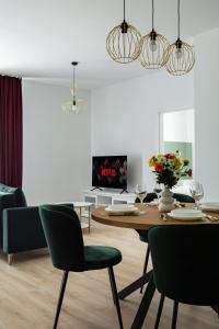 Μια τηλεόραση ή/και κέντρο ψυχαγωγίας στο Sika Winn Premium Apartment- private parking