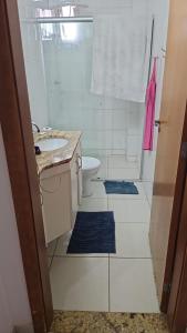 Koupelna v ubytování apartamento proximo de todos comercios + 13 fotografií