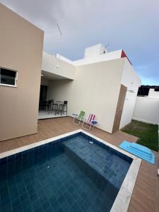 Bazén v ubytování Casa de Temporada com Piscina e Área Gourmet Toda montada nebo v jeho okolí