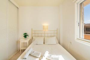 Postel nebo postele na pokoji v ubytování Costa Sol Seaside Home + 56 fotografií