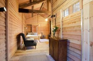 Ένα ή περισσότερα κρεβάτια σε δωμάτιο στο Dog Crag Cabin
