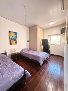 Postel nebo postele na pokoji v ubytování Finca en Santiago del Estero + 4 fotografie