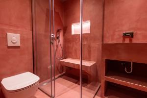 a bathroom with a toilet and a glass shower at Zorka in Budva +35 photos