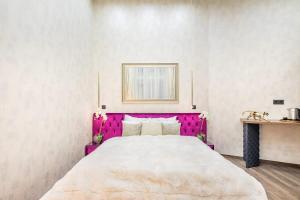 Ένα ή περισσότερα κρεβάτια σε δωμάτιο στο Ultra Central Modern Luxury