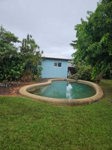 a small pool of water in the middle of a yard at Gorgeous Private Relaxing Quite Homestay in Westcourt