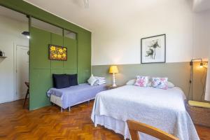 Postel nebo postele na pokoji v ubytování Apartamento no Centro do Rio + 17 fotografií