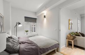 Ένα ή περισσότερα κρεβάτια σε δωμάτιο στο Cozy Apartment in the Heart of Oslo