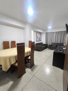 Et opholdsområde på Apartamento Av Las Americas 3 habitaciones