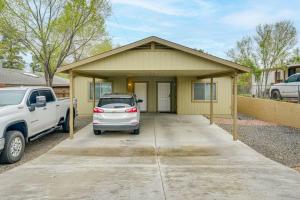 a car parked in front of a house at Walk to Downtown Prescott with Fenced Yard! in Prescott