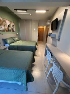 TV/trung tâm giải trí tại Flat Garvey Hotel Brasília 835