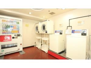 a room with two machines and two stools at Smile Hotel Tokushima - Vacation STAY 61134v in Tokushima