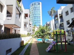 a playground in the courtyard of a apartment building at Comfort Security and Prime location in Santa Cruz de la Sierra
