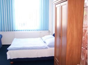 Postel nebo postele na pokoji v ubytování Hotel U Jelena