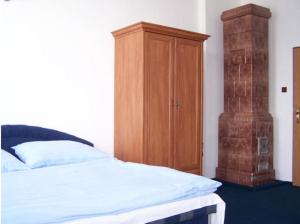 Postel nebo postele na pokoji v ubytování Hotel U Jelena