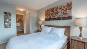 Ένα ή περισσότερα κρεβάτια σε δωμάτιο στο Pinnacle Paradise #2306