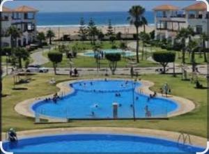 Bazén v ubytování Tanger Asilah CAN 2025 Stay Mer Piscine nebo v jeho okolí + 3 fotografie