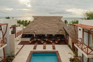 an aerial view of a resort with a swimming pool at Cielo Bonito Hotel Boutique in Isla Aguada