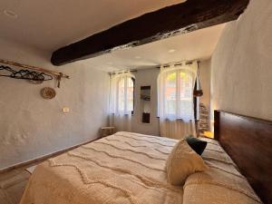 Postel nebo postele na pokoji v ubytování La Casa del Chiarore