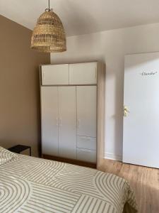 Postel nebo postele na pokoji v ubytování Apartment T2