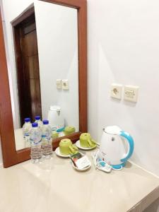 Příslušenství pro přípravu čaje a kávy v ubytování Charlitoz Homestay