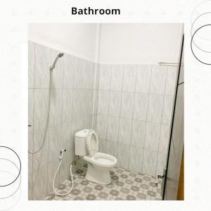 Koupelna v ubytování Charlitoz Homestay + 4 fotografie