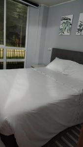 Ένα ή περισσότερα κρεβάτια σε δωμάτιο στο Departamento central 3D 1b estacionamiento factura +7 φωτογραφίες