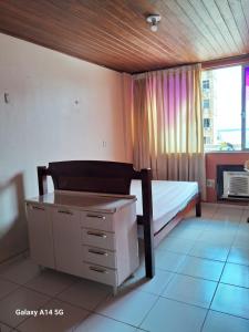 Ένα ή περισσότερα κρεβάτια σε δωμάτιο στο Apartamento no centro de Belém +6 φωτογραφίες