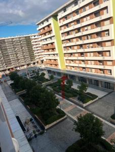 an aerial view of a large apartment building at White Homes - Central Point in Podgorica
