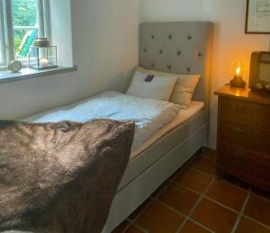 Ένα ή περισσότερα κρεβάτια σε δωμάτιο στο Rural Guest Apartment In Grevlunda Hills