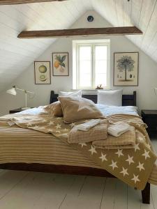 Ένα ή περισσότερα κρεβάτια σε δωμάτιο στο Rural Guest Apartment In Grevlunda Hills