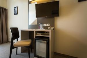 Kuchyň nebo kuchyňský kout v ubytování Corvin Hotel Budapest Corvin Wing
