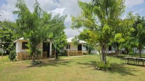 a house with trees in front of it at Yuvraj Fort Pushkar by Data Mansa Hukam Pvt Ltd in Pushkar