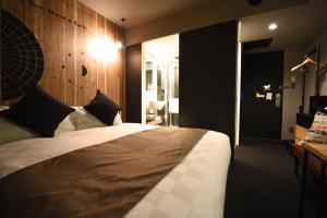 Postel nebo postele na pokoji v ubytování Hotel Risveglio Akasaka