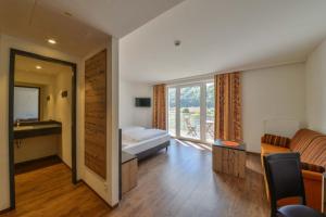 Postel nebo postele na pokoji v ubytování Hotel Gasthof Heckl