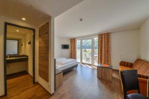 En eller flere senger på et rom på Hotel Gasthof Heckl