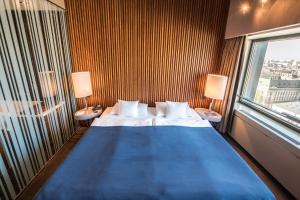 Postel nebo postele na pokoji v ubytování Hotel Yasmin Košice