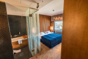 Postel nebo postele na pokoji v ubytování Hotel Yasmin Košice