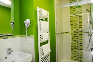 Ένα μπάνιο στο Hotels & Résidences - Le Metropole