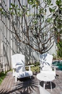 O grădină în afara Villa Xaloc by House of Winds - Stunning Balinese retreat next to Canggu +40 fotografii