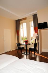 Et værelse på Hotels & Résidences - Le Metropole
