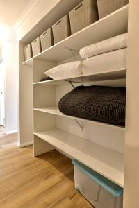 a room with a shelf with pillows on it at 42 Old Murbko Road in Morgan