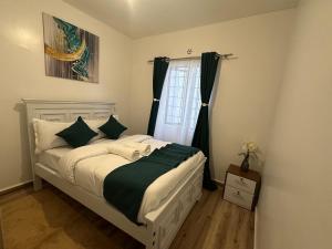 Postel nebo postele na pokoji v ubytování Restful Escape- 2br with Pool TatuCity + 25 fotografií