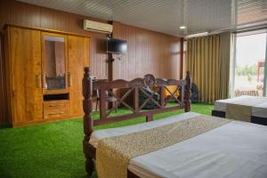 TV a/nebo společenská místnost v ubytování Ruvini Leisure Resort