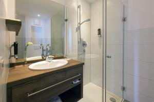 Koupelna v ubytování Hotel am Schrannenplatz + 21 fotografií