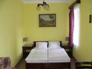 Katil atau katil-katil dalam bilik di Pension a restaurace Rudolec