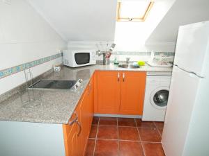 Kuchnia lub aneks kuchenny w obiekcie Apartamentos Rurales Casa Tata