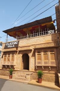 a building with a sign that reads classic villa at Classic Villa - Near Jaisalmer Fort in Jaisalmer