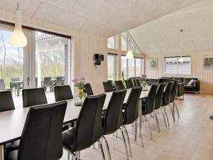 a conference room with a long table and chairs at 5 star holiday home in Kappeln in Kappeln