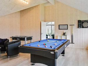 a billiard room with a pool table in a room at 5 star holiday home in Kappeln in Kappeln