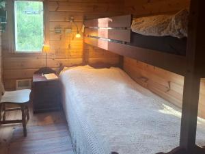 Postel nebo postele na pokoji v ubytování Family Cabin Cluster By Waterfall In Bjorli